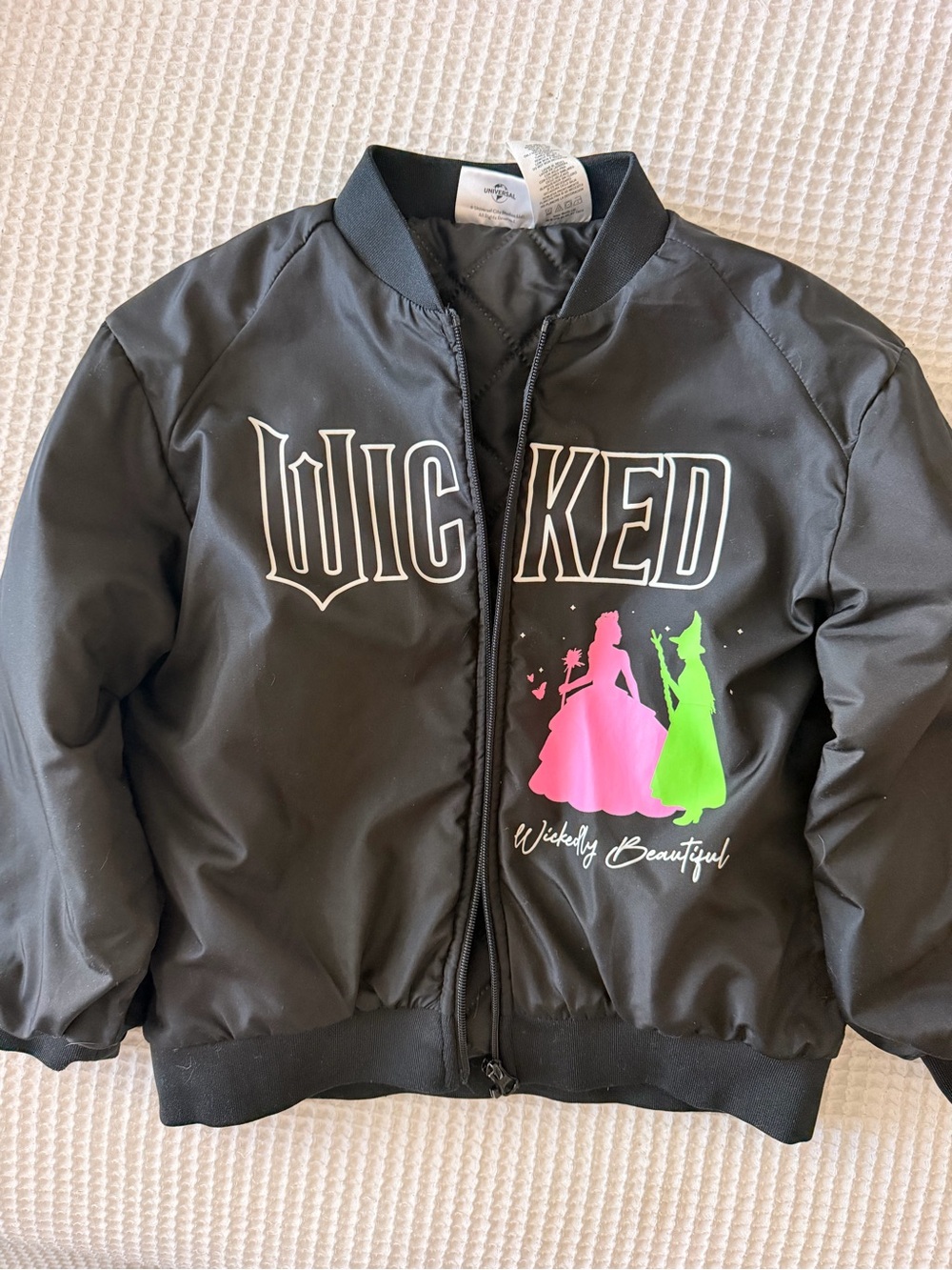 Kids Black 'Wicked' Graphic Puffer Jacket with Pink & Green Accents